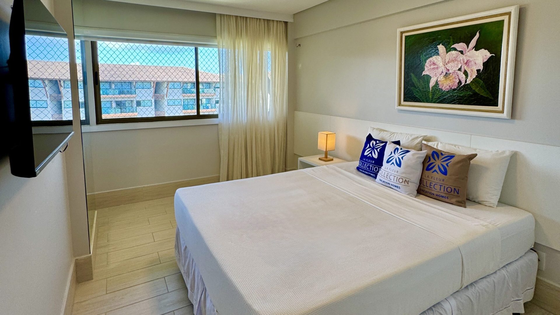 Suíte master com vista panorâmica para o mar e enxoval de luxo